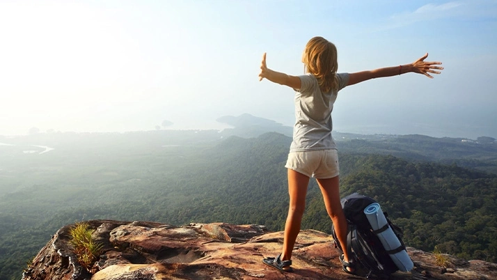 Chiropractic Towson MD Woman On Mountain
