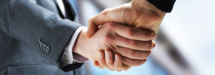Chiropractic Towson MD Business Handshake