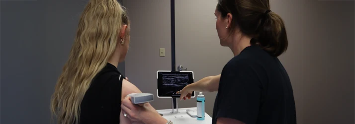 Nurse Practitioner Giving Patient Ultrasound Therapy